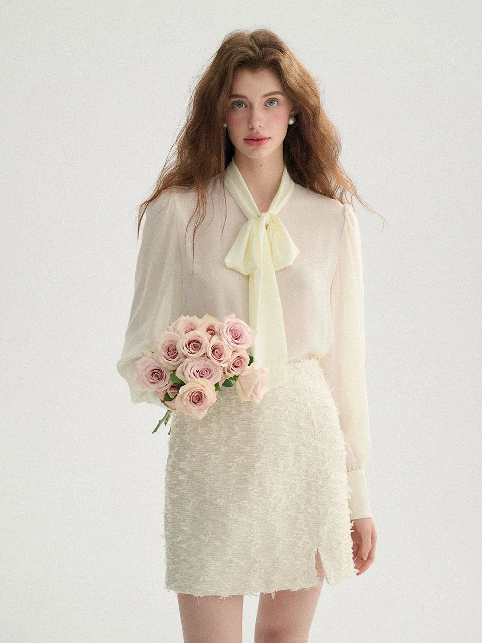 Eburnean tweed skirt