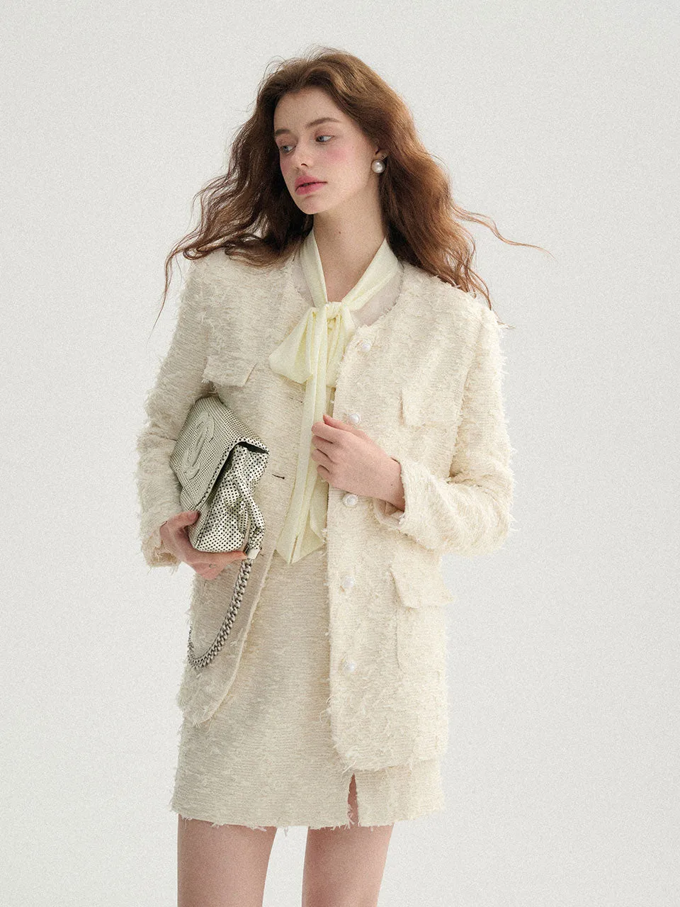 Eburnean tweed skirt
